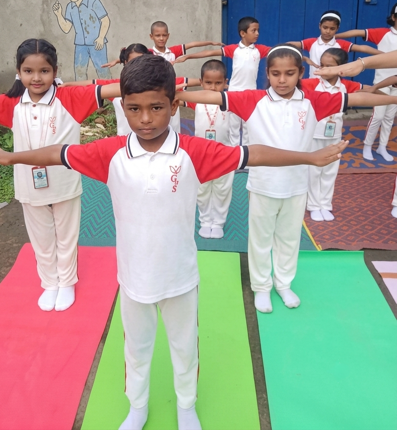 Students actively participating in a group Yoga and exercise session on colorful mats